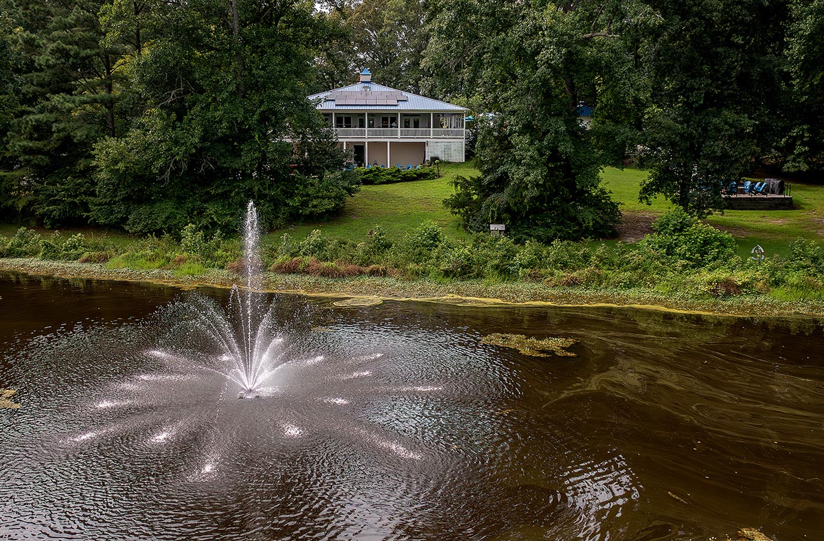 Aerial photo of lake and fountain at Gauthier Vineyard